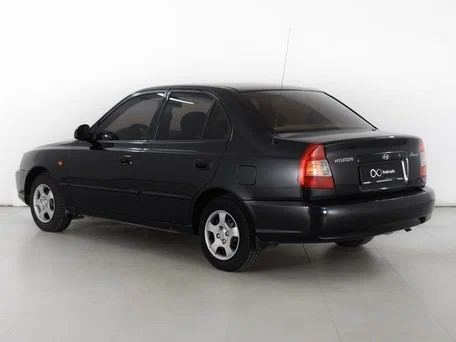 Стекло двери задн. Hyundai Accent лев.